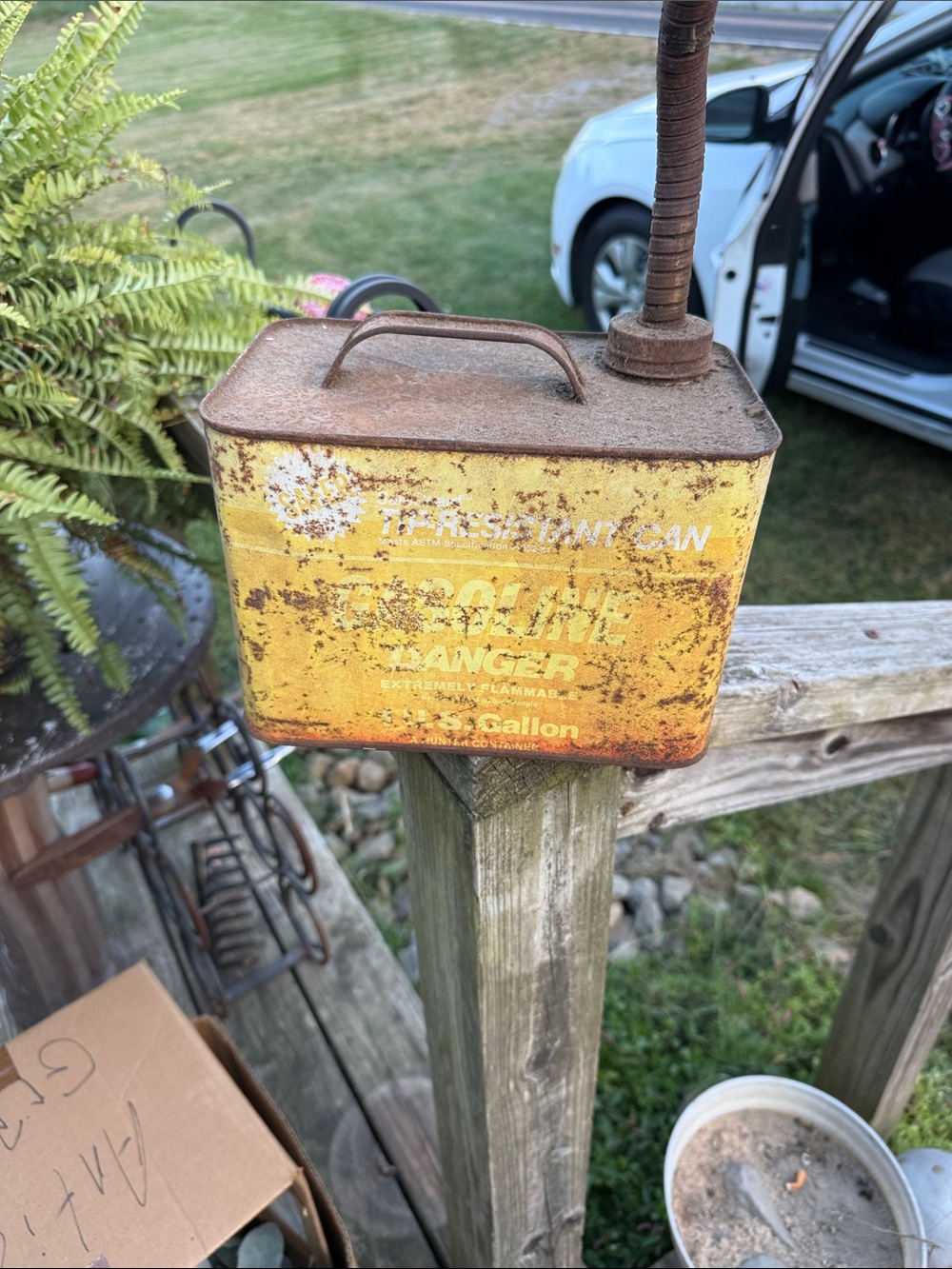 GASOLINE GLAMOUR Yellow Rusted Metal Gas Can Decor